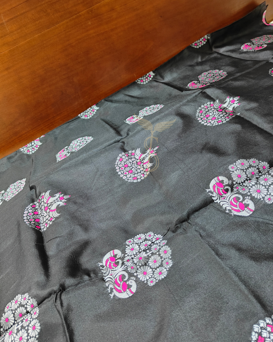 Black Banarasi Jari Silken Saree with pink peacock motifs and silver Zari