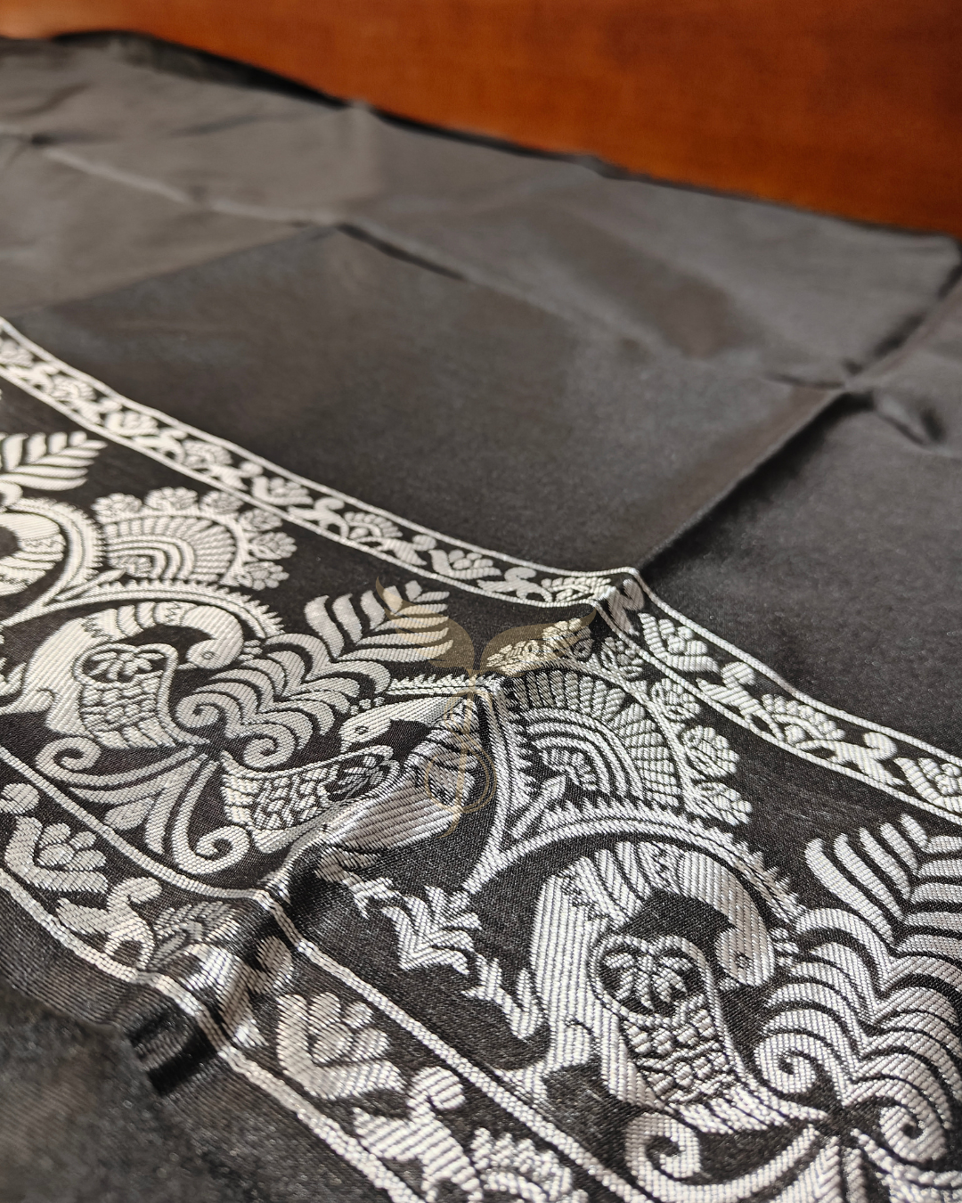Black Banarasi Jari Silken Saree with pink peacock motifs and silver Zari