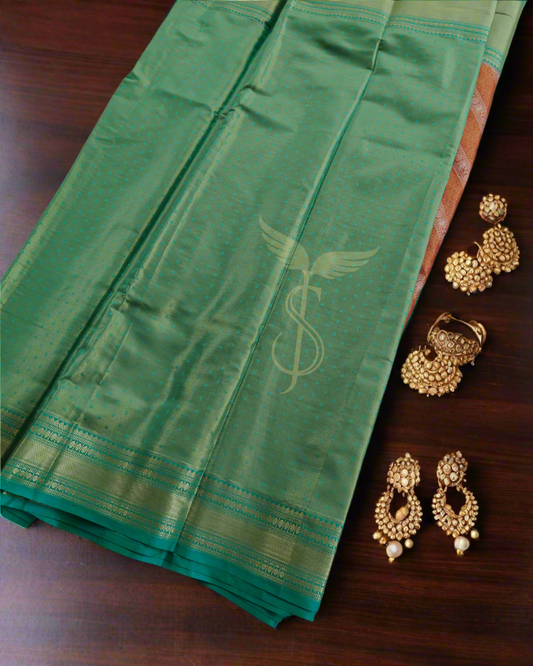 Radiant Orange & Green Kanjivaram Jari Silken Saree with Intricate Handwoven Zari Work