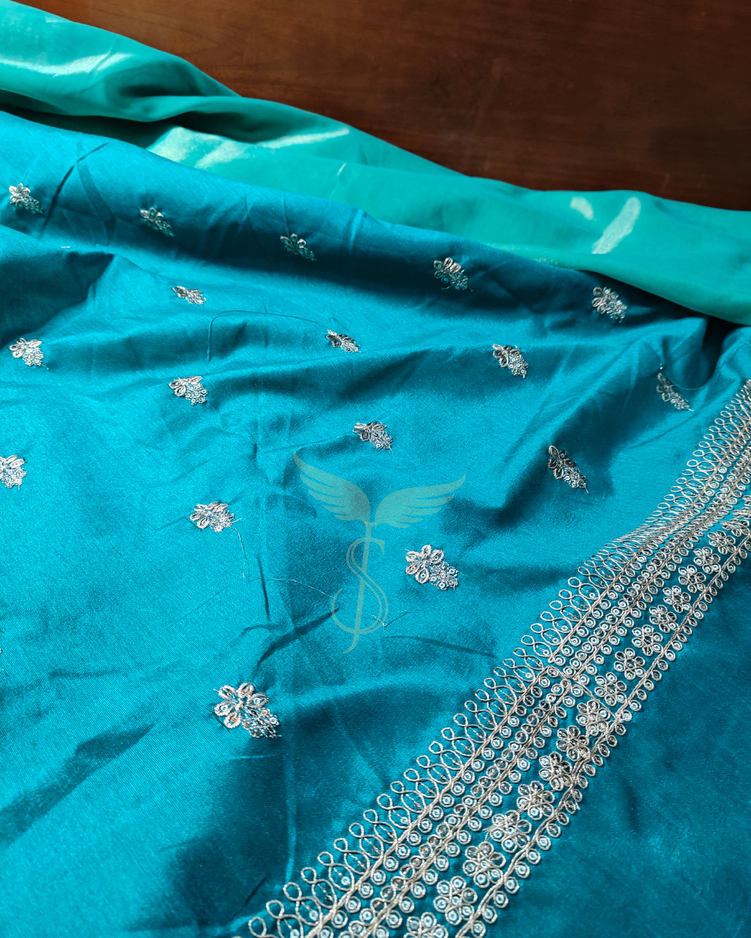 Peacock Green Tissue Banarasi Jari Silken Saree with Embroidered Turquoise Blue Blouse