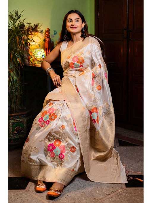 Ivory White Soft Jari Silken Saree with Vibrant Floral Weaves and Golden Zari Border