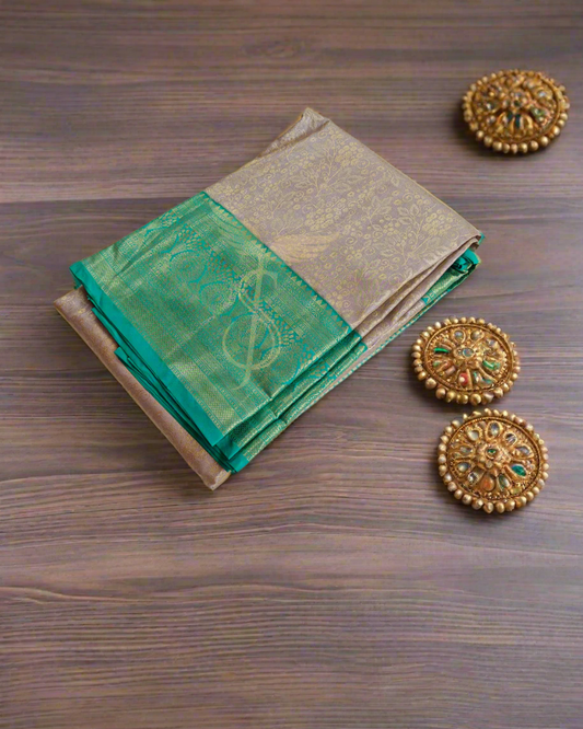 Timeless Beauty – Golden Kanjivaram Jari Silken Saree with Green Border & Handwoven Zari Work