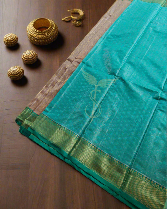 Timeless Beauty – Golden Kanjivaram Jari Silken Saree with Green Border & Handwoven Zari Work