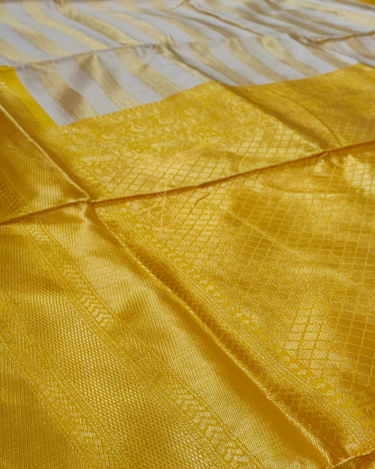 White & Gold Banarasi Jari Silken Saree with Lustrous Mustard Zari Border – Classic Temple & Festive Wear