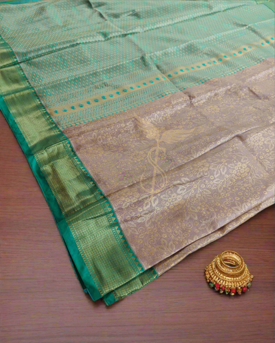 Timeless Beauty – Golden Kanjivaram Jari Silken Saree with Green Border & Handwoven Zari Work
