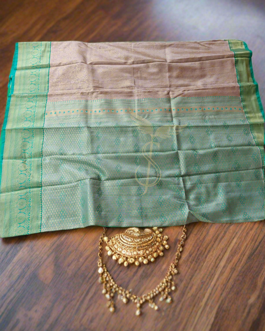 Timeless Beauty – Golden Kanjivaram Jari Silken Saree with Green Border & Handwoven Zari Work